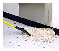 mop under waste receptacle